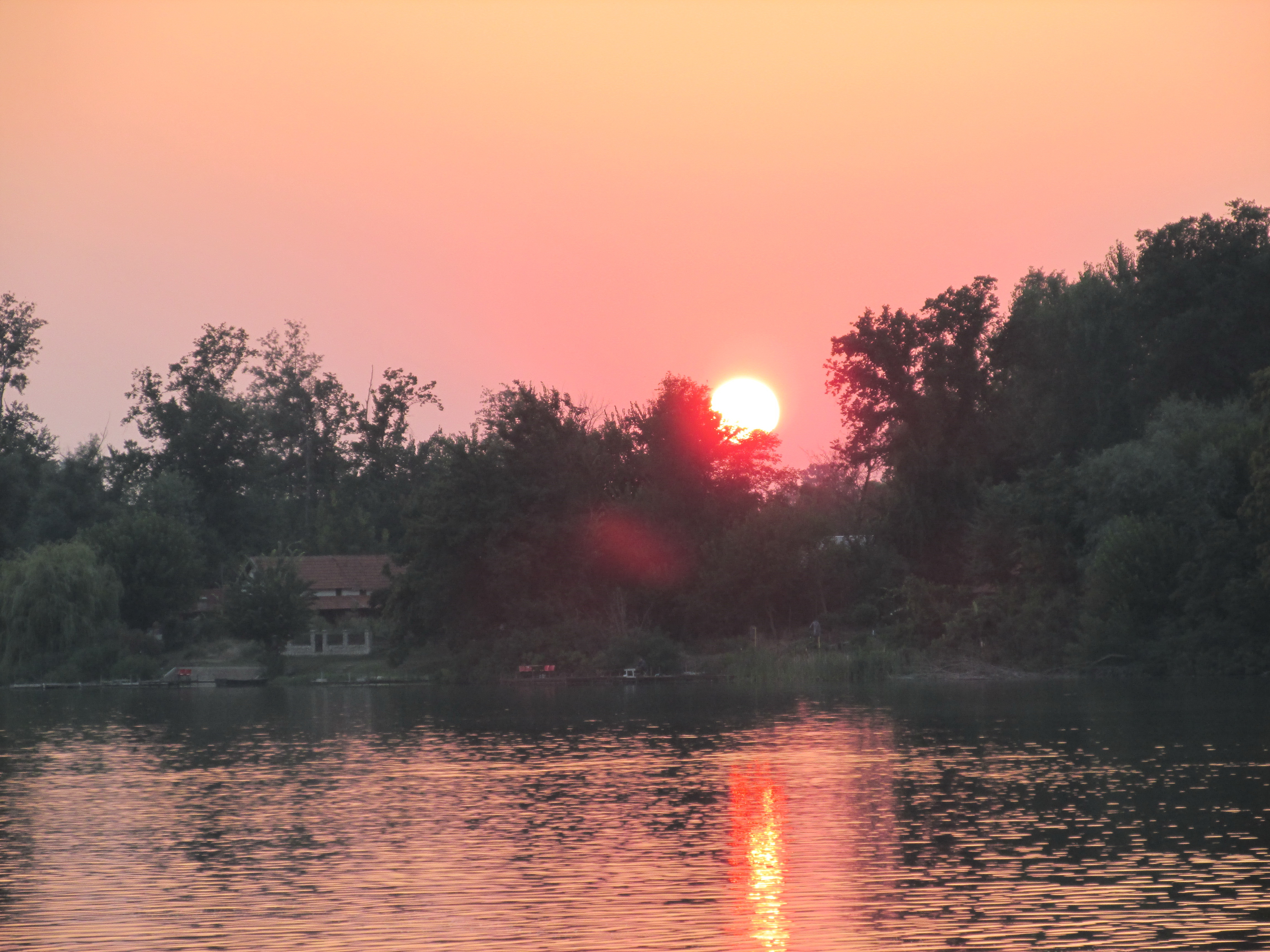 6 sunce nad jezero